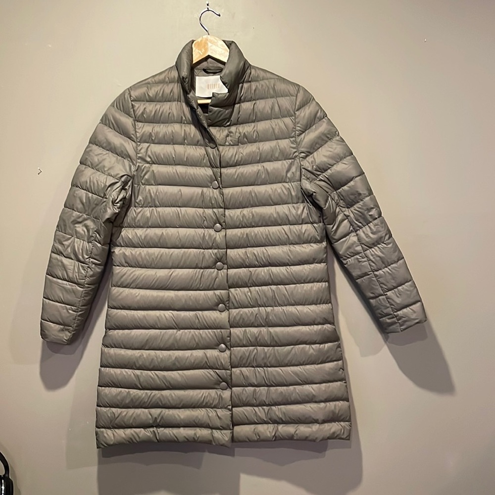 Melbon, lofty packable down, car length coat, fastens with snaps,fits 8 -10.EUC.